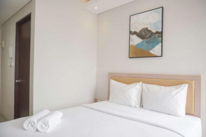 Warm and Minimalist Studio Transpark Bintaro Apartment By Travelio